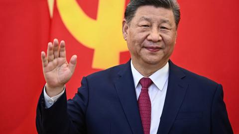 Chinese President Xi Jinping waves during a meeting with Vietnam’s Communist Party General Secretary To Lam at the Office of the Party Central Committee in Hanoi on April 14, 2025. (Nhac Nguyen via Getty Images)