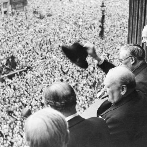 From a balcony in the Ministry of Health Building in London, Prime Minister Winston Churchill addresses a huge crowd on May 8. 1945 (Victory in Europe Day). (Getty Images)